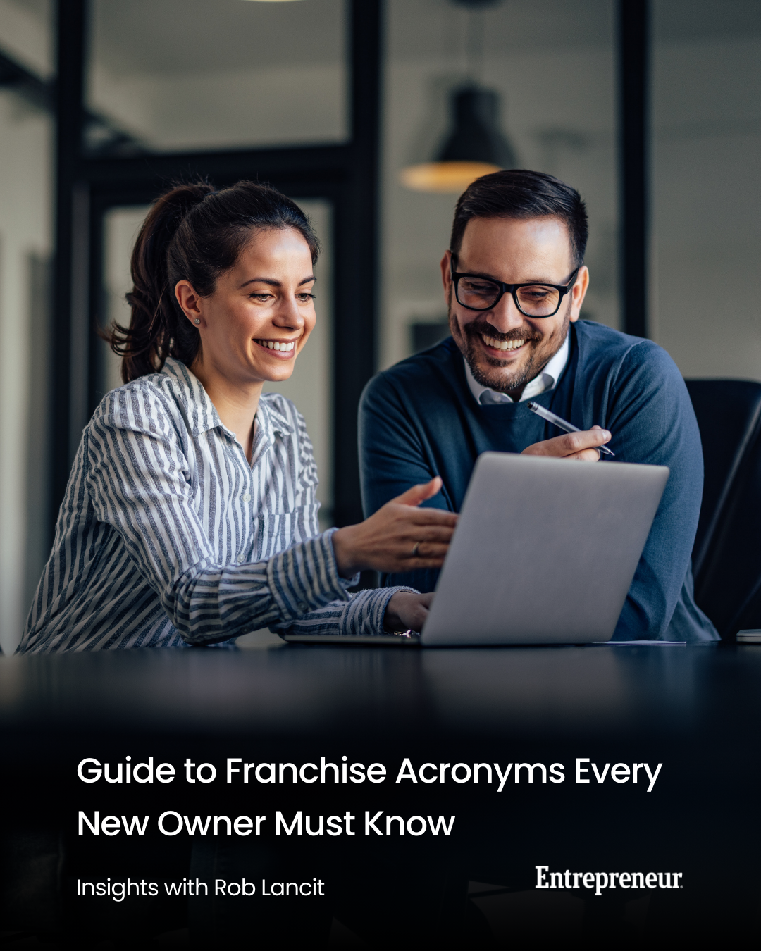 A photo of a man and woman in a meeting with the titile: Guide to Franchise Acronyms Every New Owner Must Know
