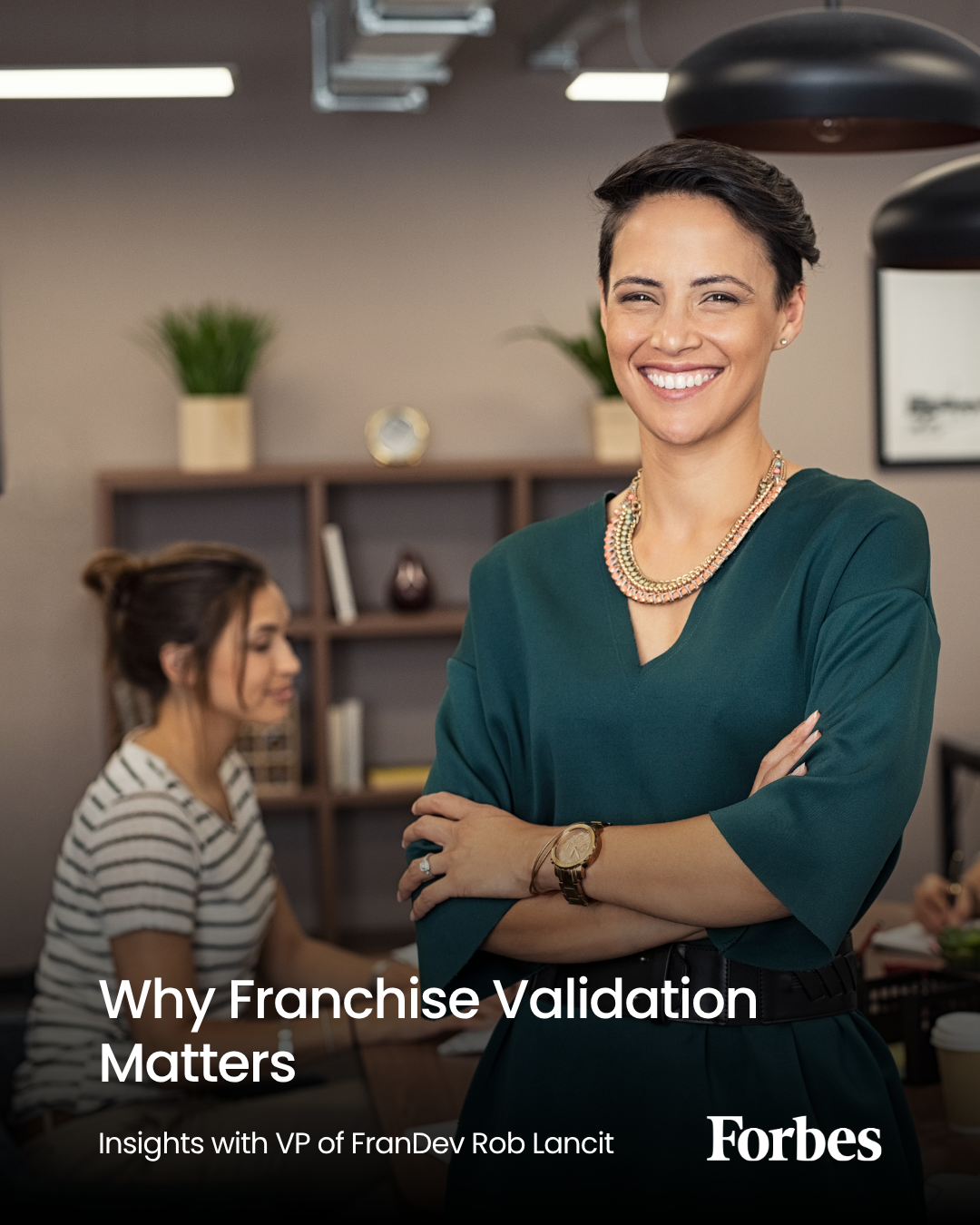 A photo of a woman in an office, smiling towards the camera. The text in the bottom reads: why franchise validation matters, insghts with VP of FranDev rob lancit. An article by Forbes Magazine.
