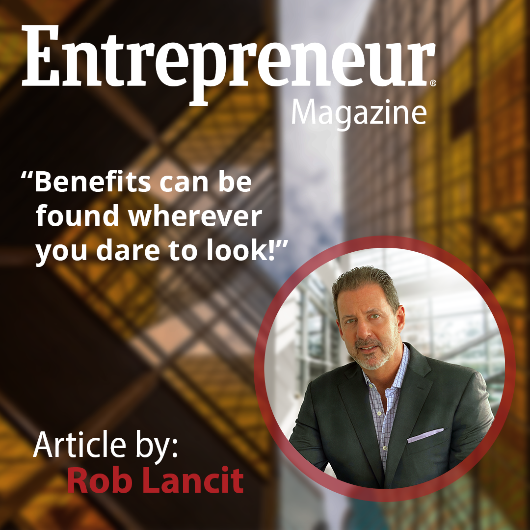 a photo of Rob Lancit, the background has some orange buildings, the text reads: “Benefits can be found wherever you dare to look!”